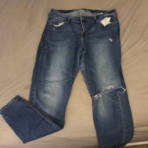 Distressed blue jeans